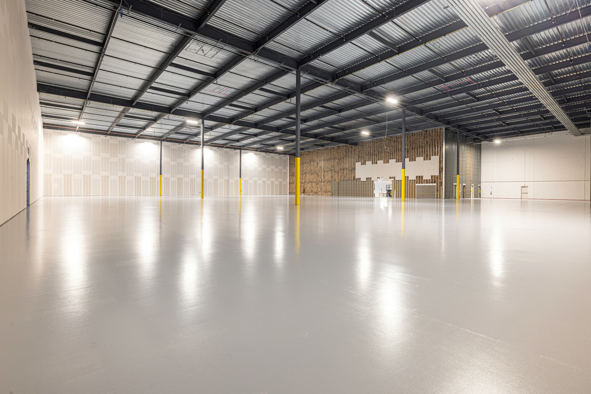 Industrial warehouse — bright white polyaspartic epoxy floor