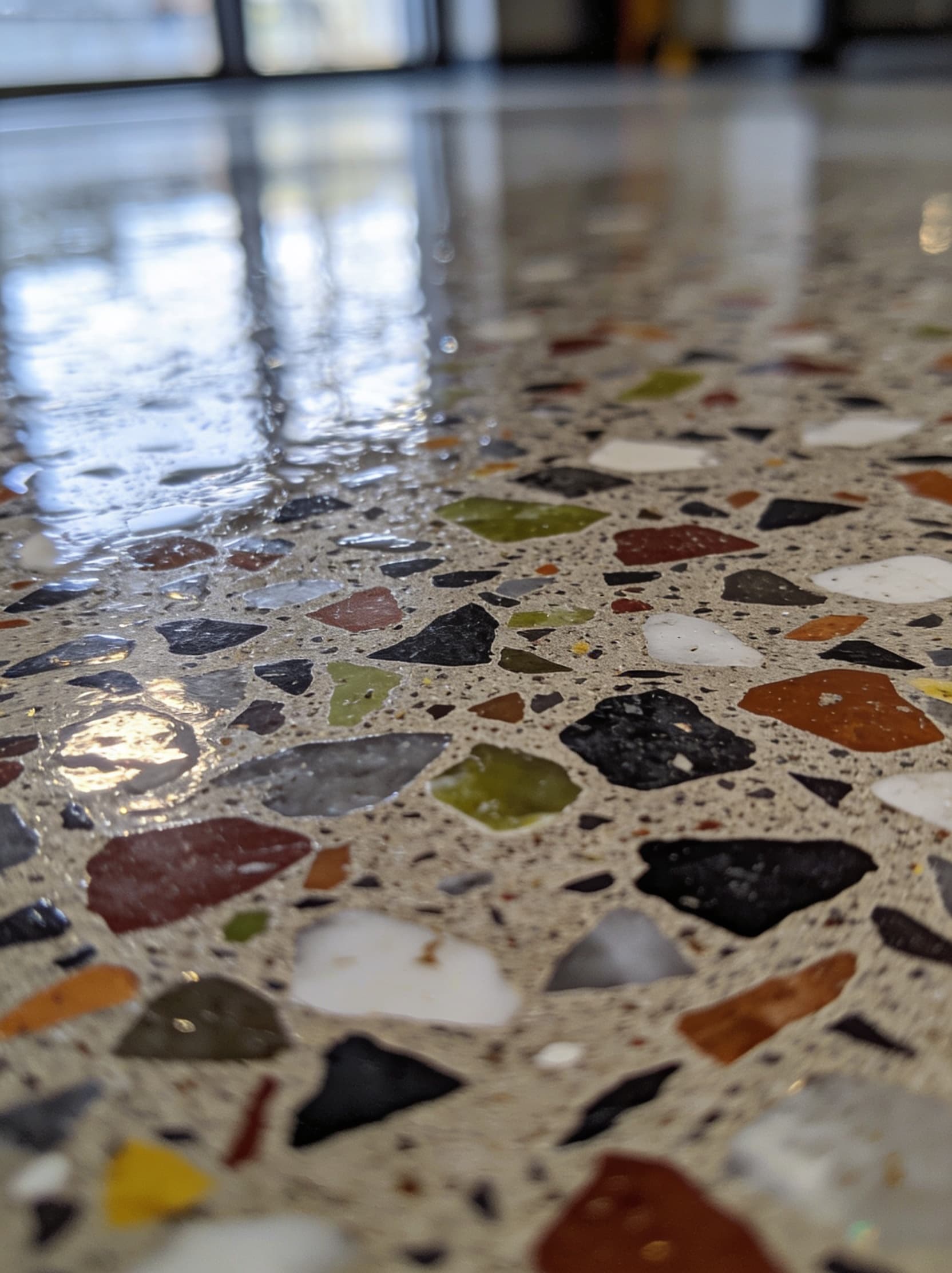 Close-up of vinyl flake chip broadcast in polyaspartic topcoat
